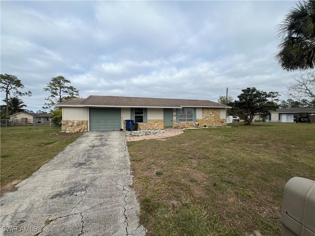 single story home with a garage and a front lawn