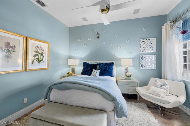 bedroom featuring hardwood / wood-style floors and ceiling fan