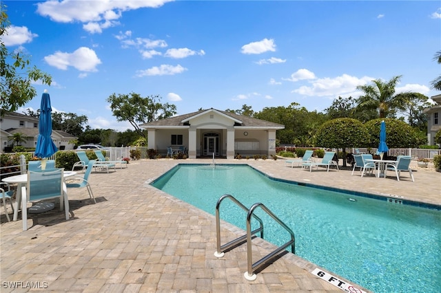 view of swimming pool featuring a patio