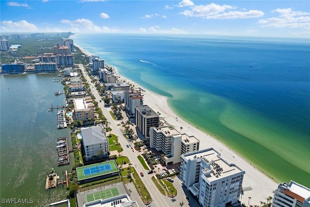 aerial view with a water view and a view of the beach