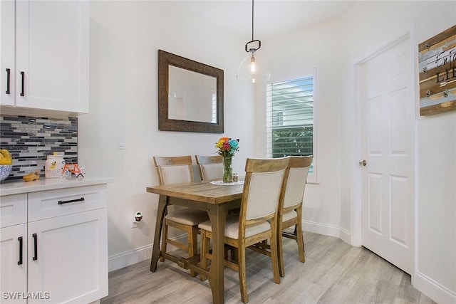 dining space featuring light hardwood / wood-style floors