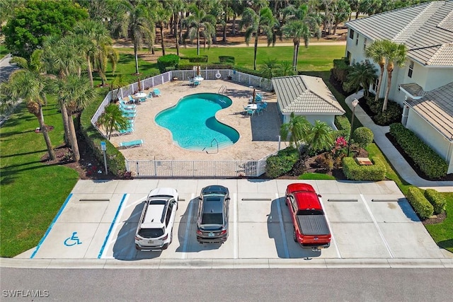 view of pool featuring a patio