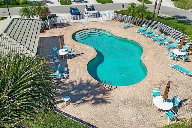 view of pool featuring a patio