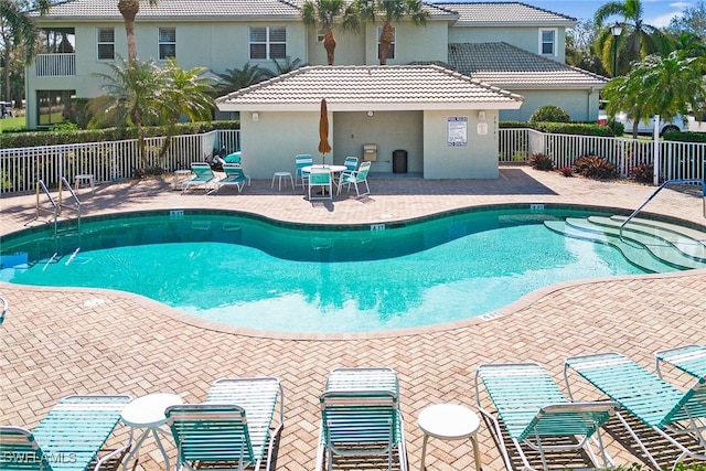 view of pool featuring a patio area