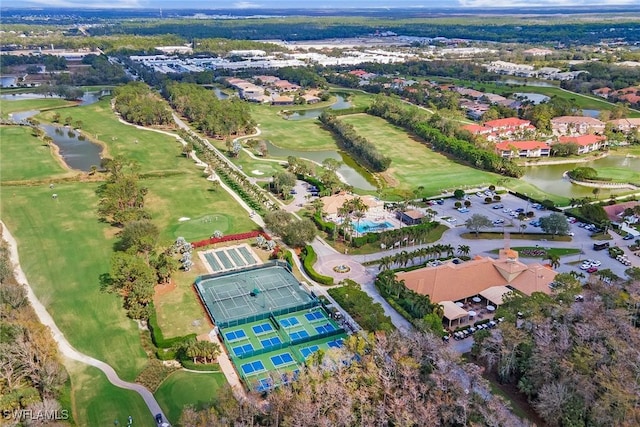 birds eye view of property featuring a water view and golf course view