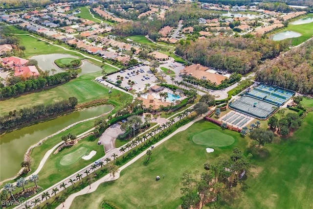 drone / aerial view featuring a water view and view of golf course