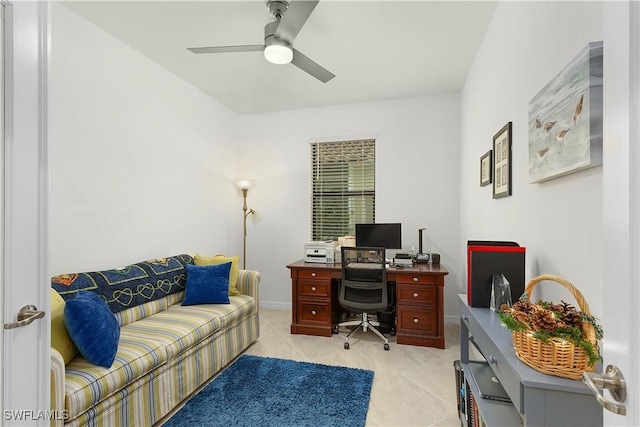 home office featuring ceiling fan and light tile patterned floors