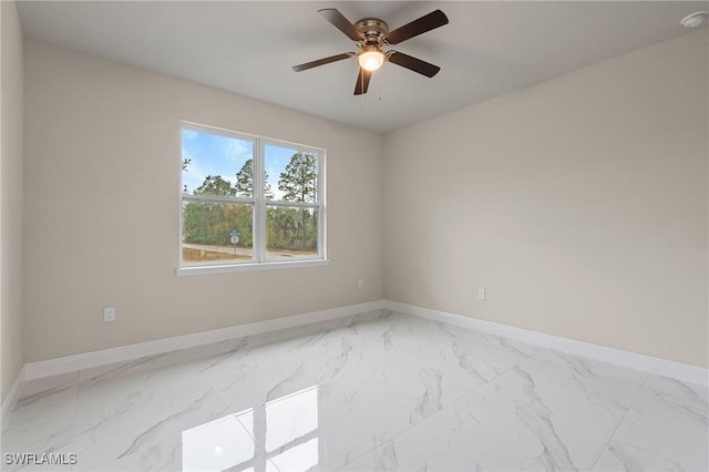 unfurnished room with ceiling fan