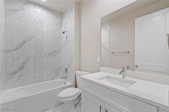 full bathroom with vanity, toilet, and tiled shower / bath