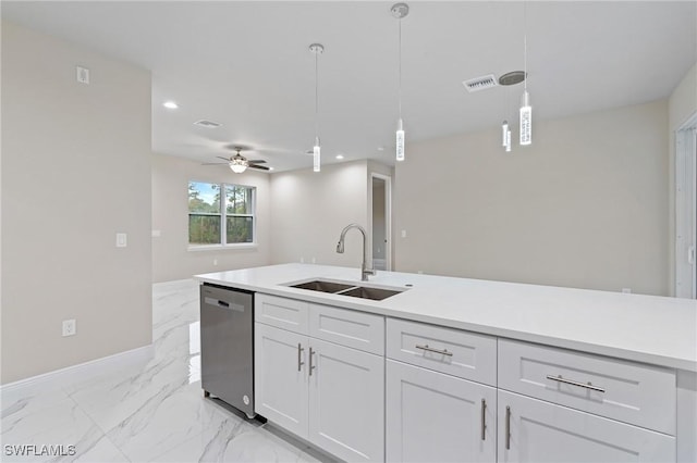 kitchen featuring sink, decorative light fixtures, stainless steel dishwasher, ceiling fan, and white cabinets