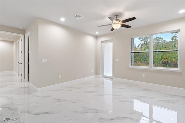 unfurnished room featuring ceiling fan