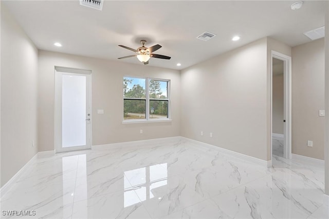 spare room featuring ceiling fan