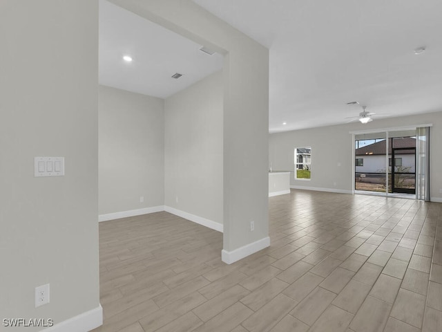 unfurnished room featuring ceiling fan