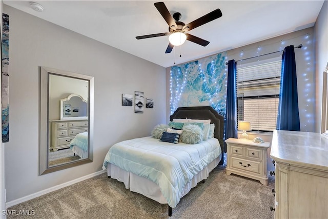 bedroom with light colored carpet and ceiling fan