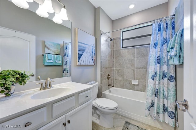 full bathroom with shower / bathtub combination with curtain, vanity, tile patterned floors, and toilet