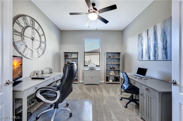 office with ceiling fan and light carpet