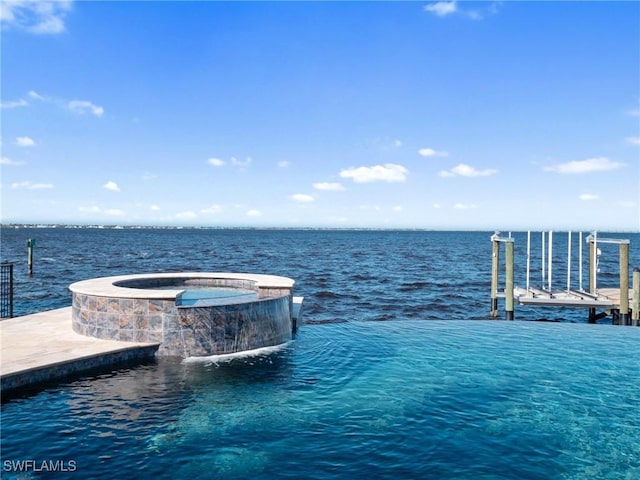 view of dock with a water view