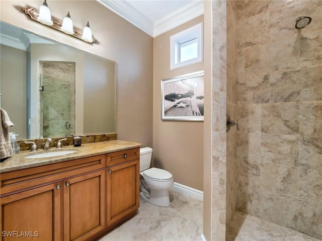 bathroom featuring ornamental molding, toilet, an enclosed shower, and vanity