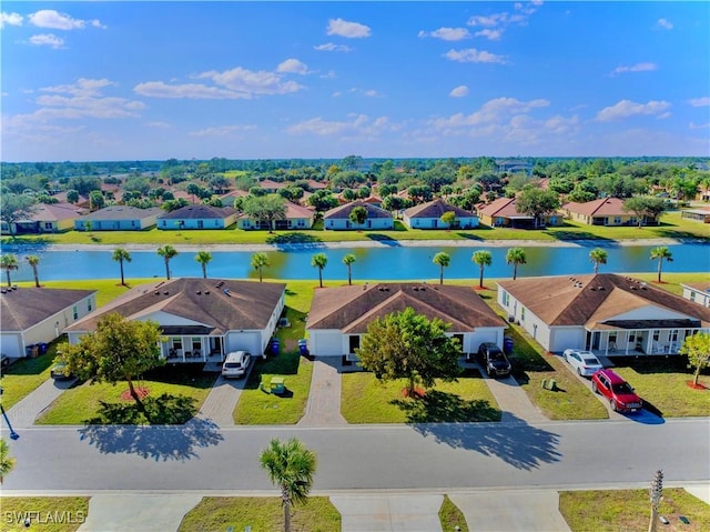 bird's eye view with a water view