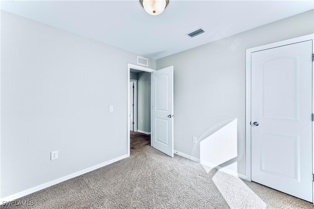 unfurnished bedroom featuring carpet floors