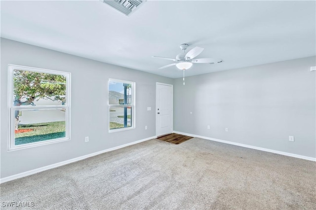 unfurnished room featuring carpet flooring and ceiling fan