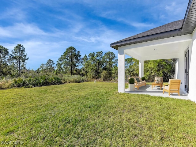 view of yard featuring a patio area