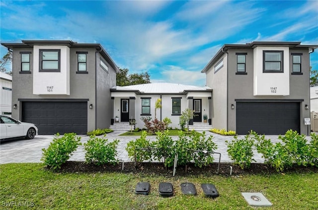 view of front of property featuring a garage