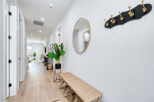 corridor featuring light hardwood / wood-style flooring