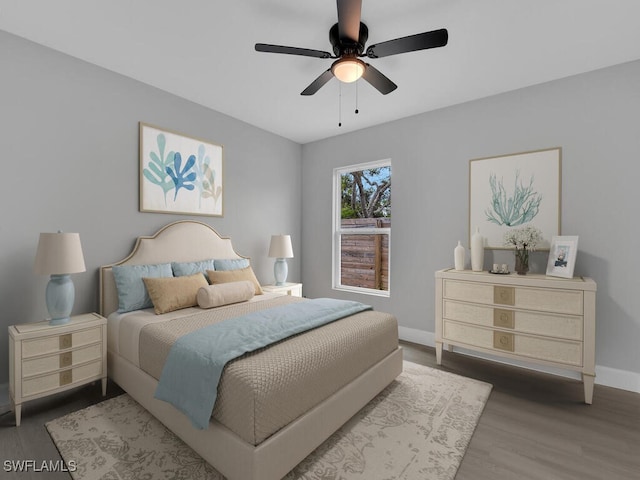 bedroom featuring ceiling fan and wood-type flooring