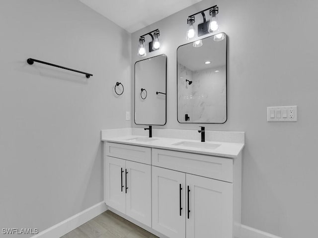 bathroom featuring vanity and walk in shower