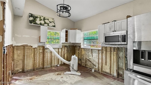 kitchen with white cabinetry, plenty of natural light, and appliances with stainless steel finishes