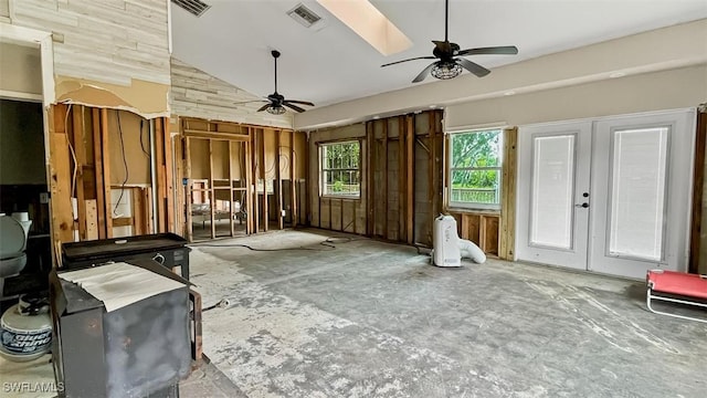 miscellaneous room with french doors, ceiling fan, and lofted ceiling