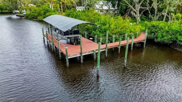 dock area featuring a water view