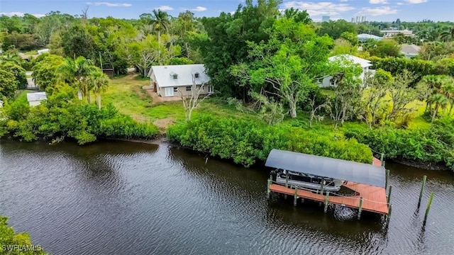 drone / aerial view with a water view