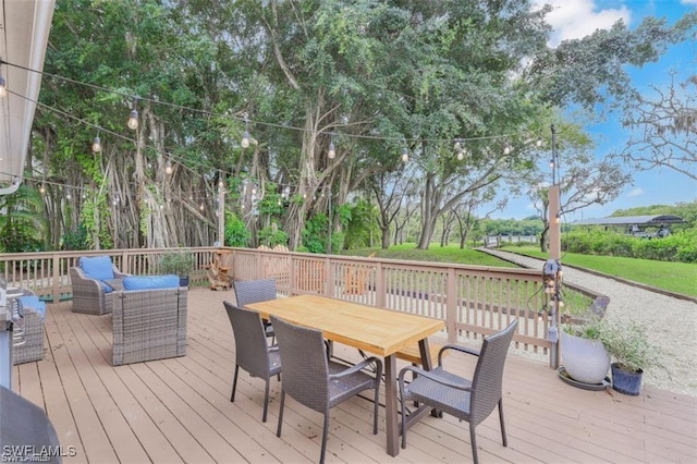 wooden deck featuring outdoor lounge area