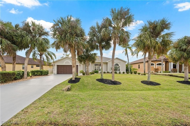 view of front of property with a garage and a front lawn