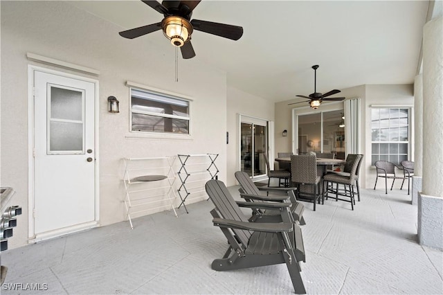 view of patio / terrace with a ceiling fan and outdoor dining area