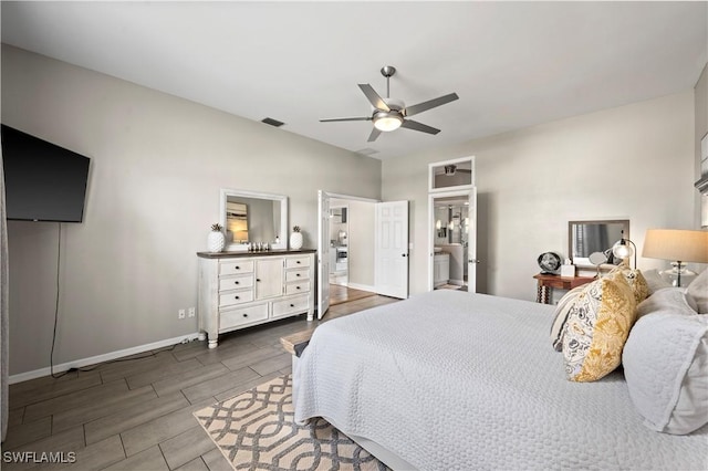 bedroom with wood tiled floor, visible vents, a ceiling fan, and baseboards