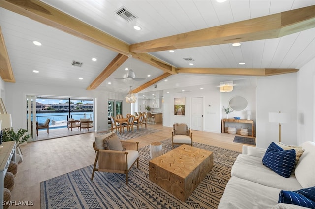 community lobby with a water view and visible vents