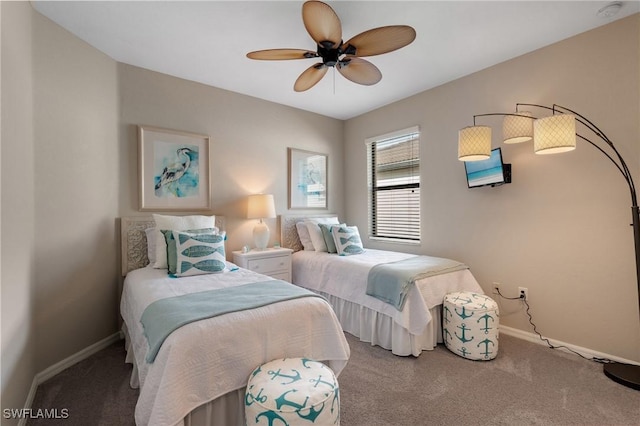 bedroom with ceiling fan and carpet