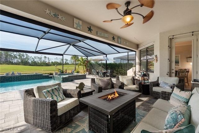 view of patio with an outdoor hangout area and glass enclosure