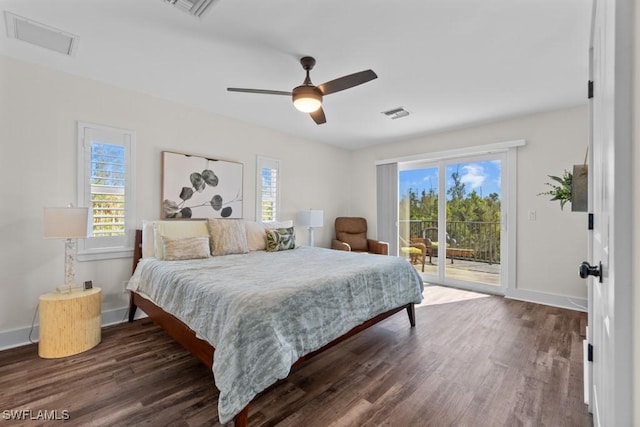 bedroom with ceiling fan, multiple windows, and access to outside