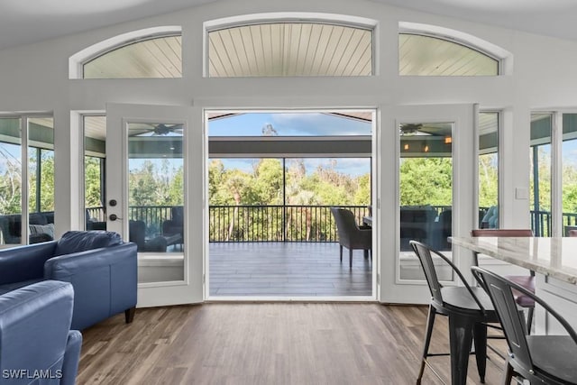 doorway to outside featuring hardwood / wood-style floors and ceiling fan