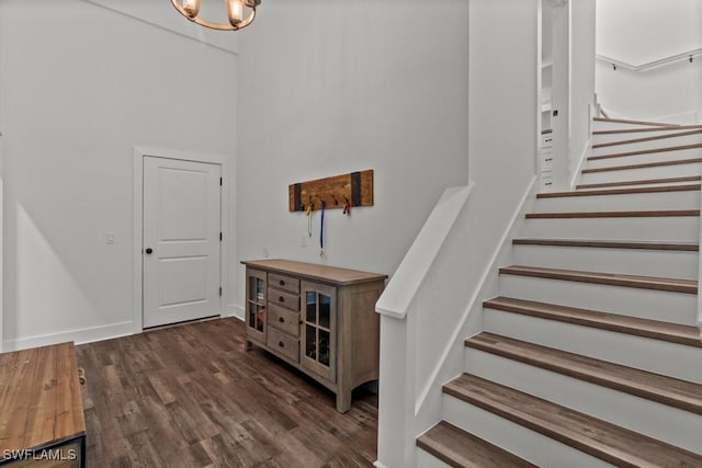 stairway with wood-type flooring