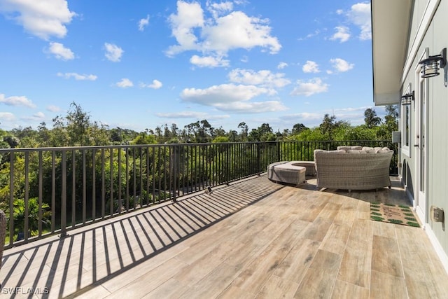 wooden deck featuring outdoor lounge area