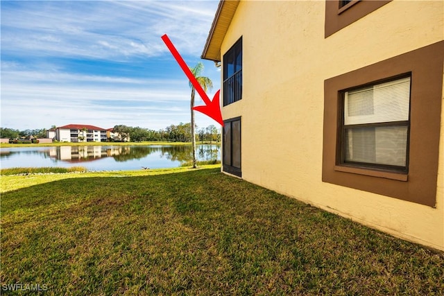 view of yard with a water view