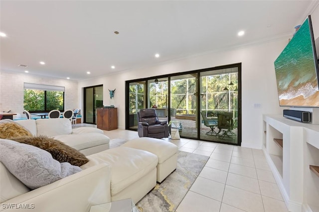 4221 5th Ave NW, Naples, FL 34119 - living area featuring light tile patterned floors, recessed lighting, baseboards, and ornamental molding