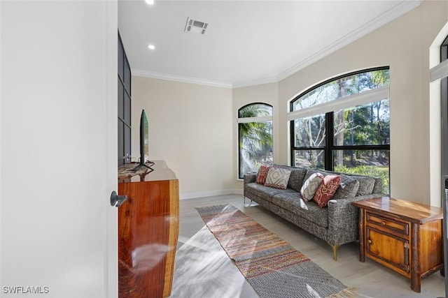 4221 5th Ave NW, Naples, FL 34119 - living room featuring ornamental molding, baseboards, and recessed lighting