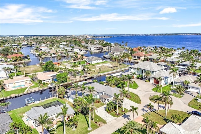 drone / aerial view with a water view