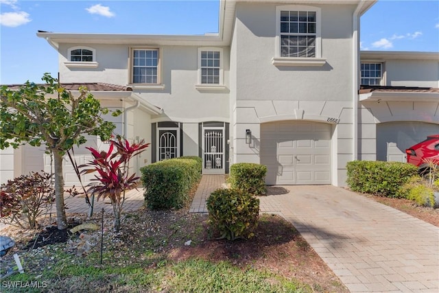 view of front of property with a garage